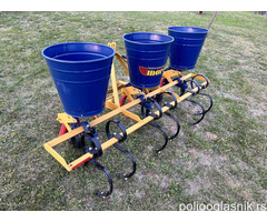 Špartač-prašač sa uređajem za bacanje đubriva