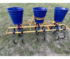 Špartač-prašač sa uređajem za bacanje đubriva